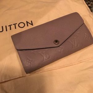 Louis Vuitton Spontini wallet in taupe